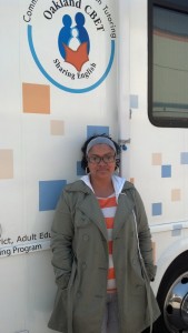 Donita McKay standing outside the Oakland adult ed computer literacy RV. (Click to enlarge).